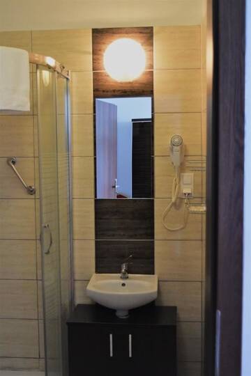 Фото номера Двухместный номер с 2 отдельными кроватями Мини-отель Hotel Złotogórski г. Kościelec 3